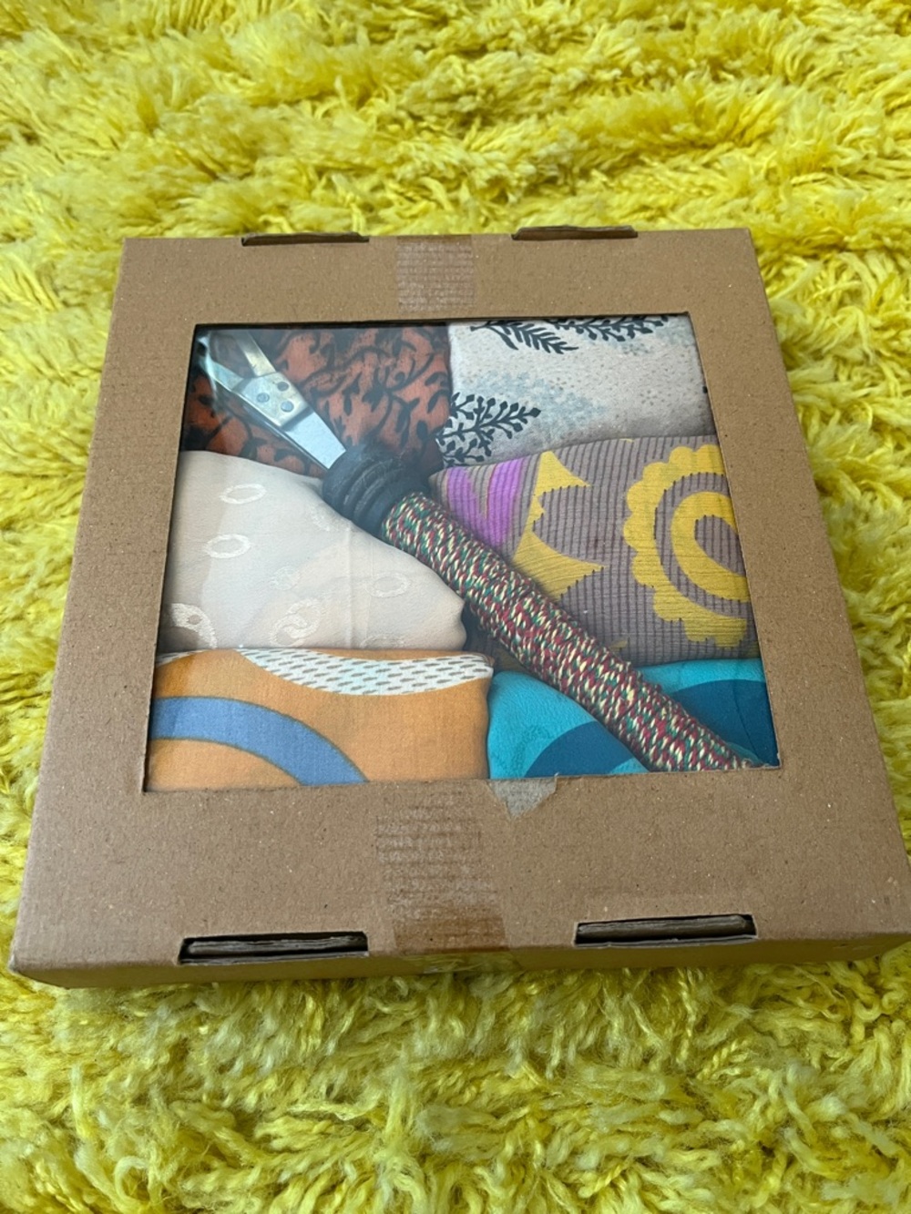 Box of Cloth Gift Wrapping and Scissors